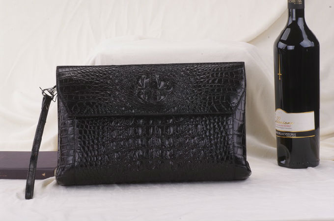 思喏登鱷魚(yú)皮具男手包一